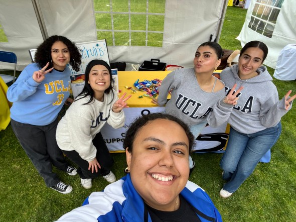 Amy with staff from the Transfer Student Center at an event.