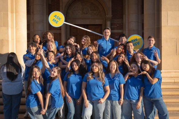 Group photo of the Bruin Ambassador Program wearing their blue UCLA polo shirts. 